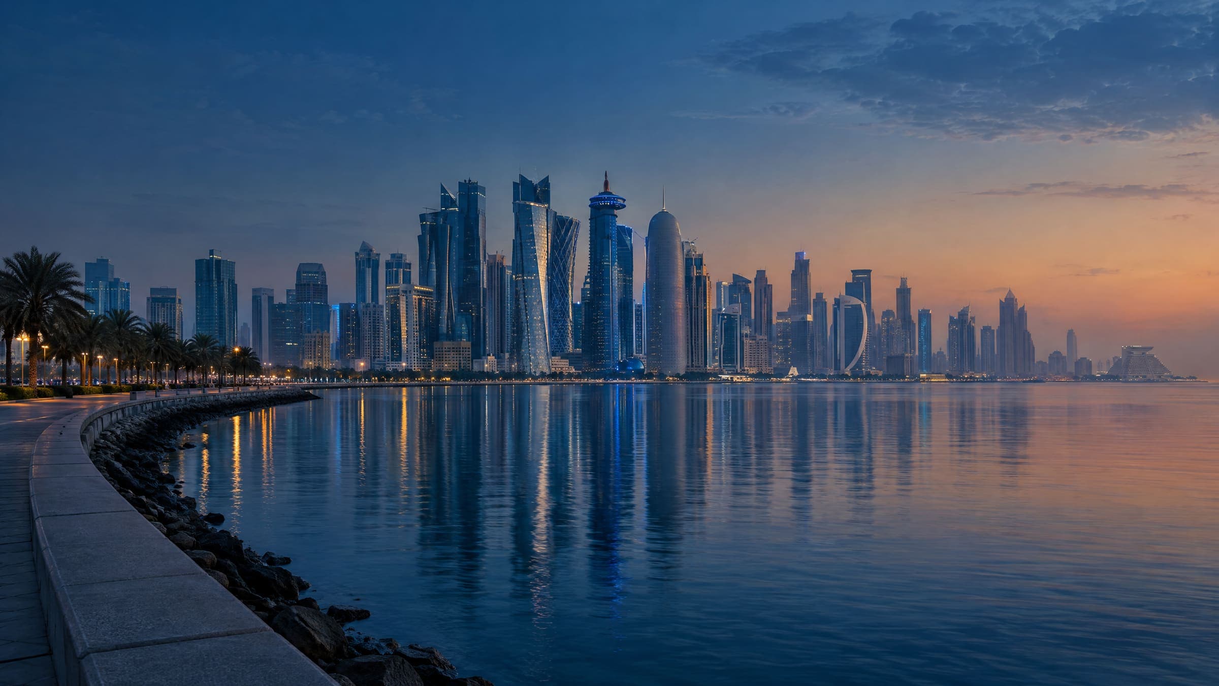 Doha's skyline across the bay in soft evening light