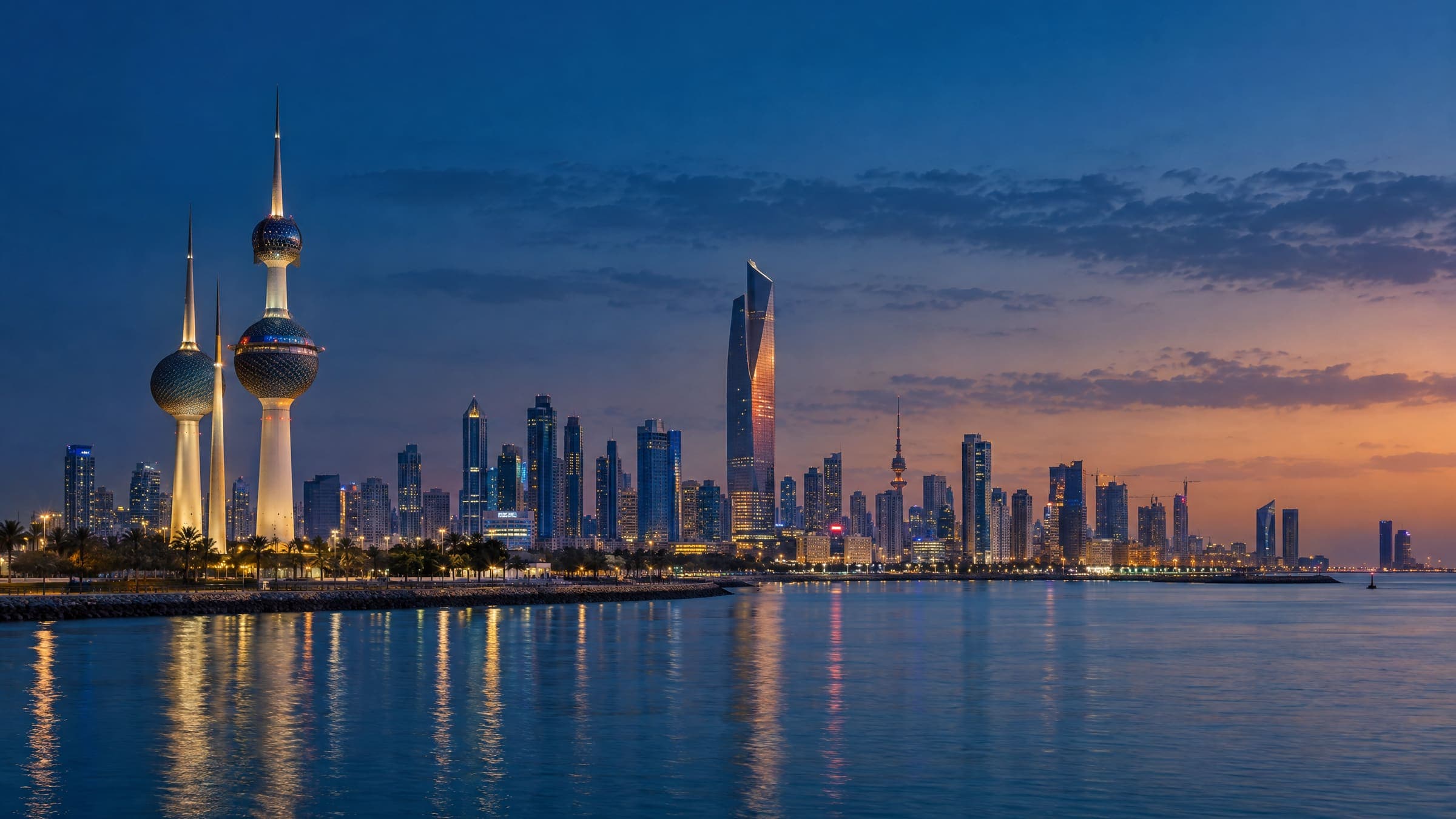 Kuwait City's skyline along the waterfront in early evening