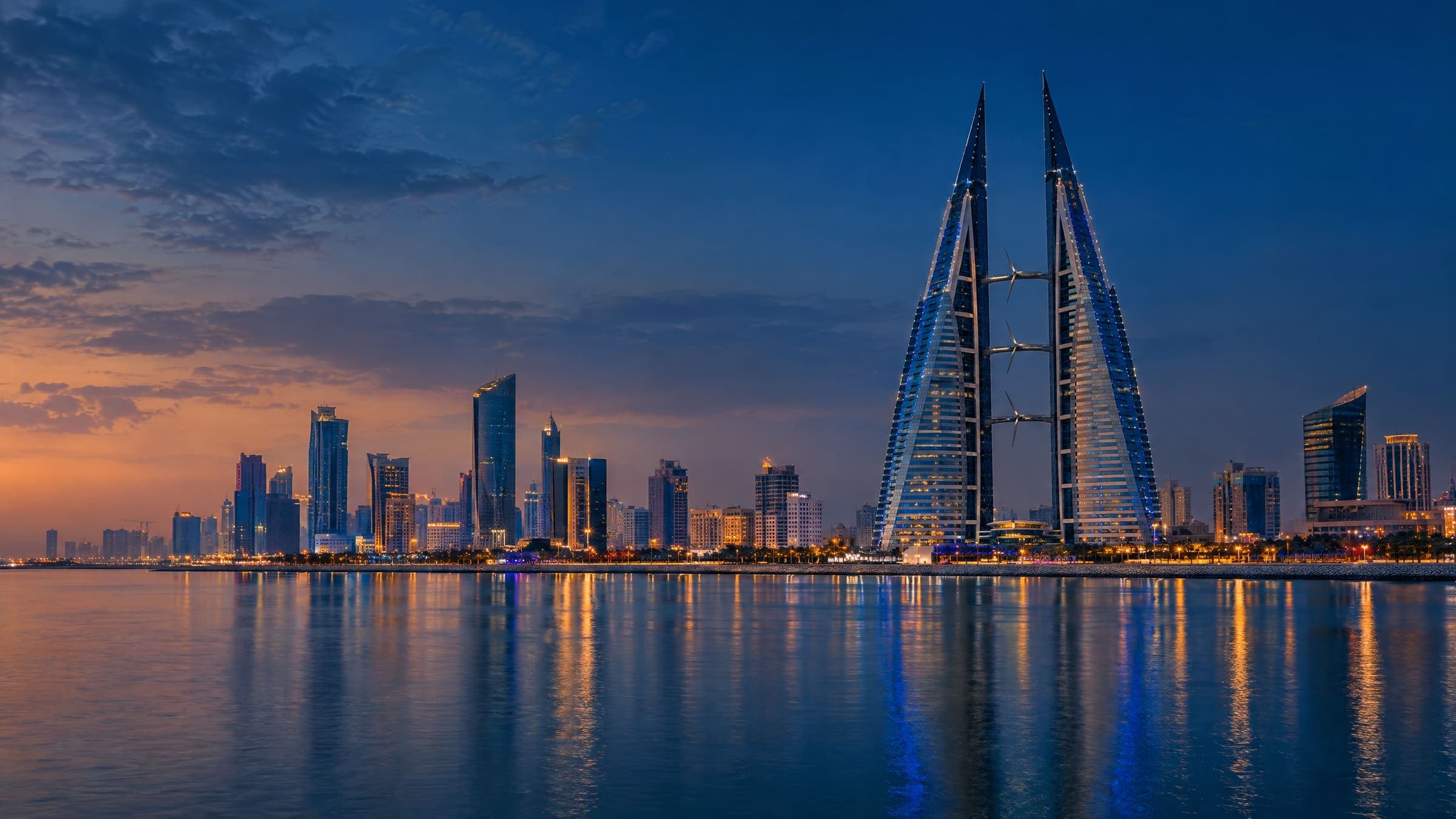 Manama's financial district towers beside the water
